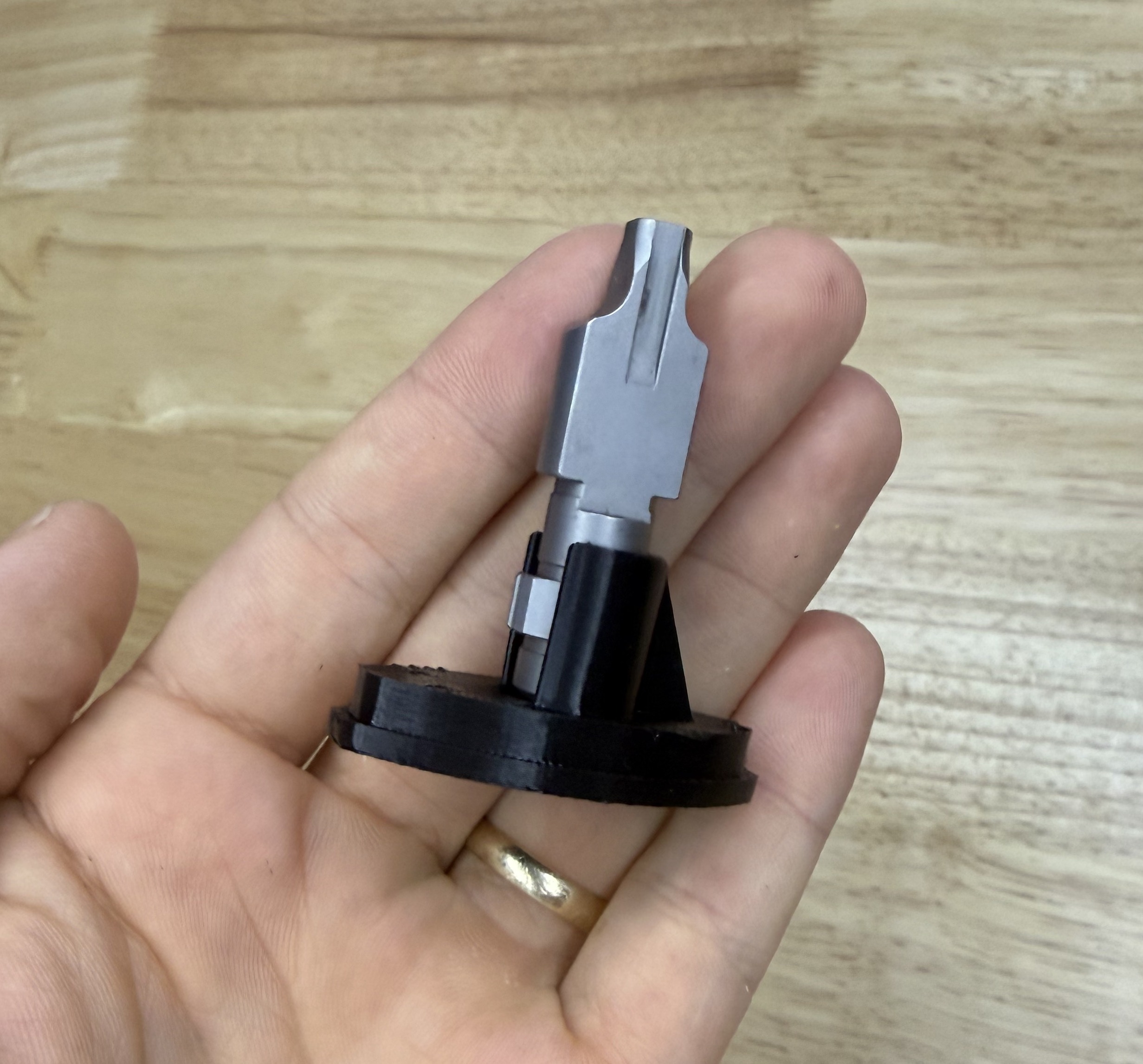 MP5 grip plug holding an MP5 locking piece